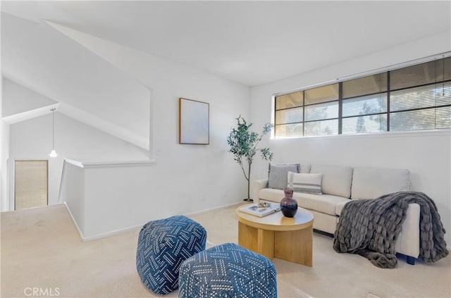 living room with carpet floors and lofted ceiling