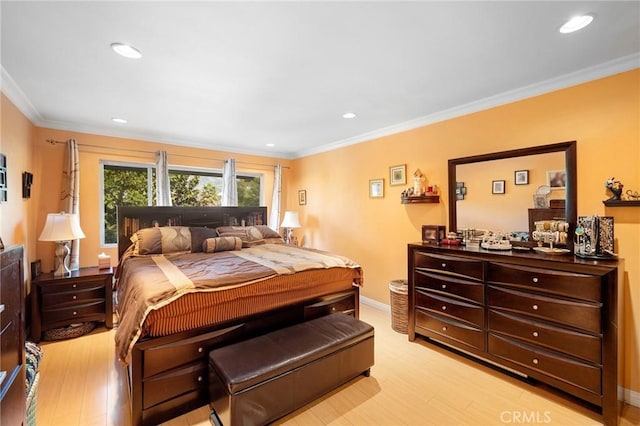 bedroom with crown molding and light wood-type flooring