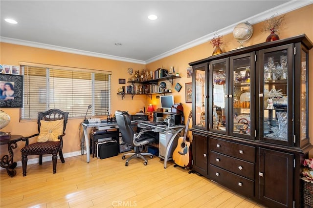 office featuring light hardwood / wood-style flooring and ornamental molding