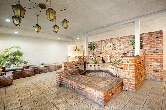 interior space with a textured ceiling