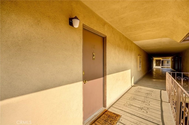 property entrance with a balcony