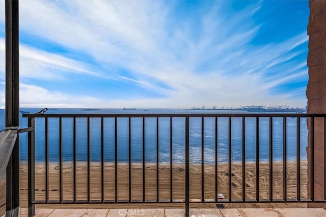 view of water feature with a beach view