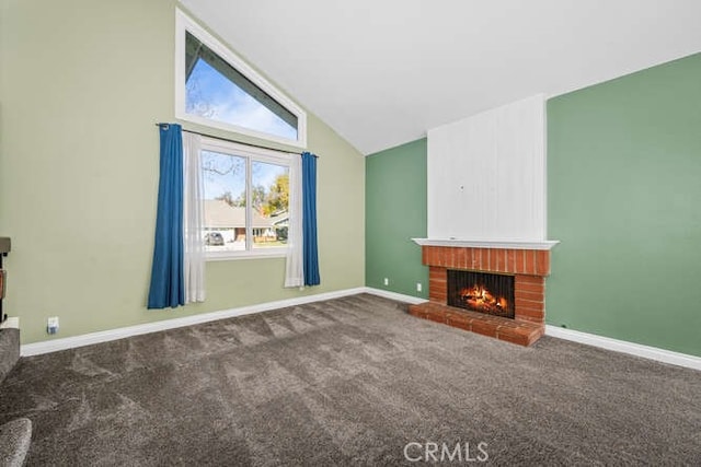 unfurnished living room featuring a brick fireplace, high vaulted ceiling, and carpet flooring