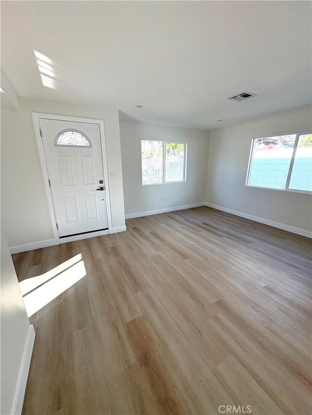 foyer entrance featuring light hardwood / wood-style floors