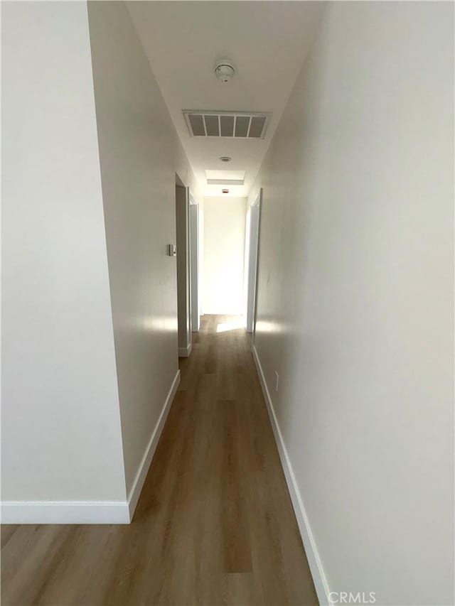 hall featuring dark wood-type flooring