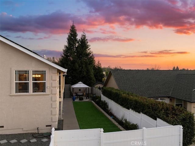 view of yard with a fenced backyard