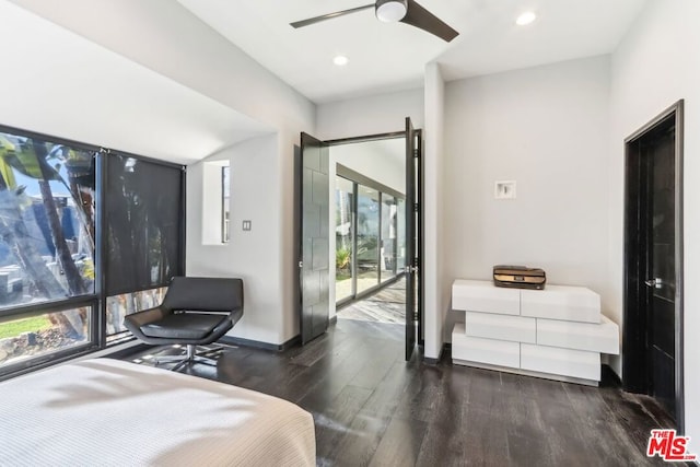 bedroom featuring ceiling fan, multiple windows, dark hardwood / wood-style floors, and access to outside