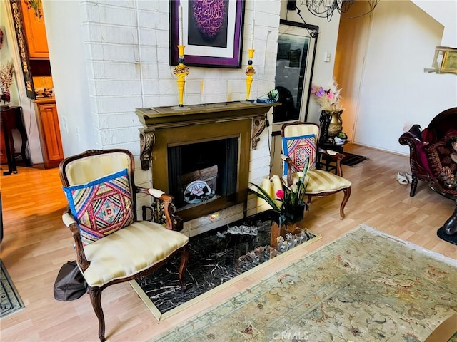 sitting room featuring light hardwood / wood-style floors