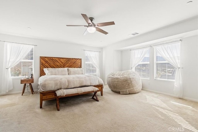 bedroom featuring ceiling fan and carpet flooring