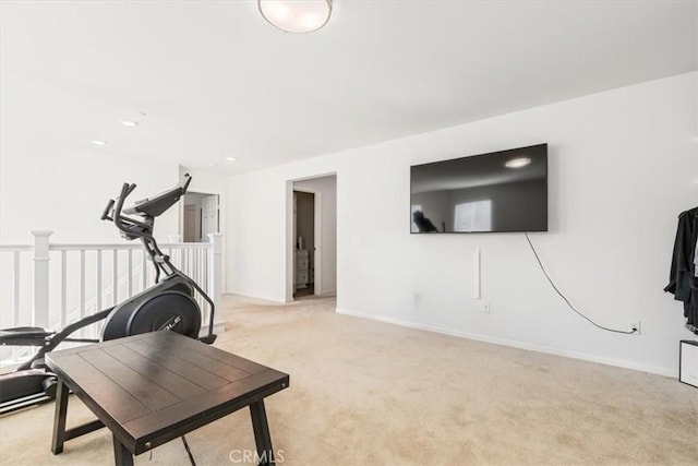 workout room with light colored carpet