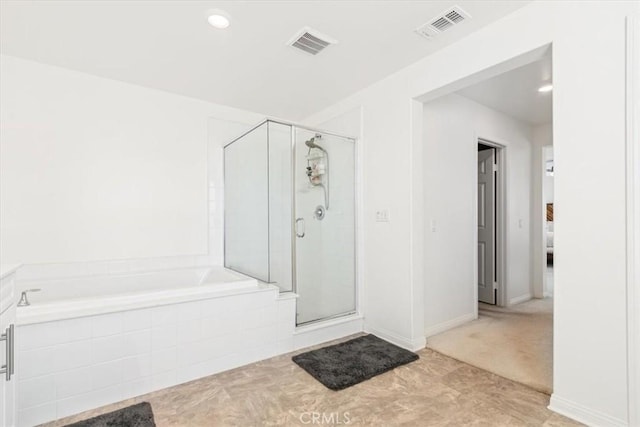 bathroom with independent shower and bath