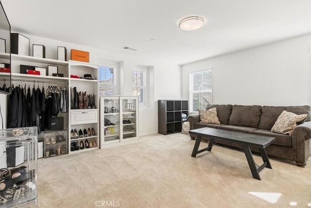 living room with light colored carpet