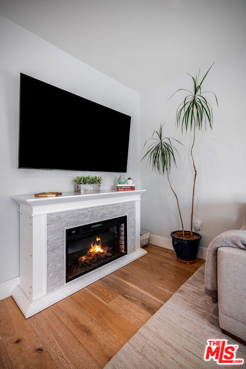 interior details with hardwood / wood-style flooring