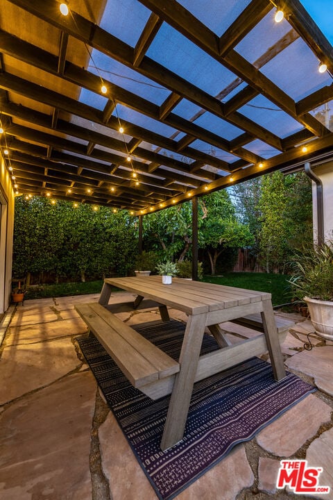 view of patio featuring a pergola