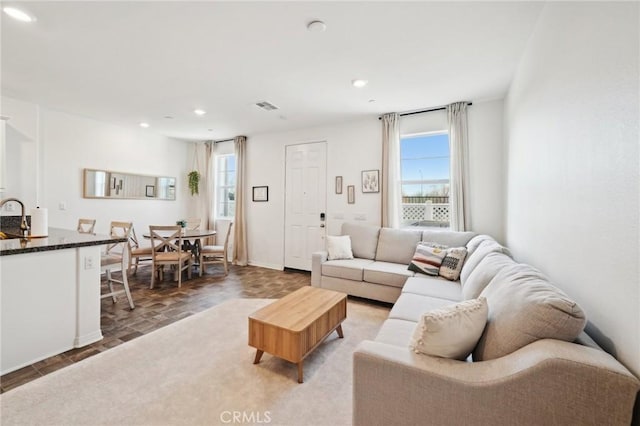 living room with sink