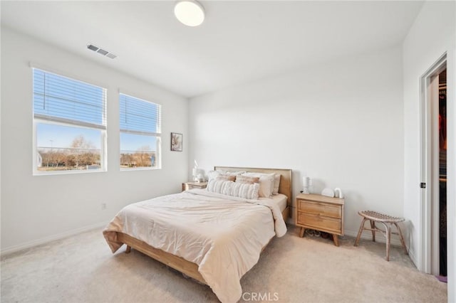 34495 Agave Dr Unit 1103, Winchester, CA 92596 - bedroom featuring light carpet, visible vents, and baseboards