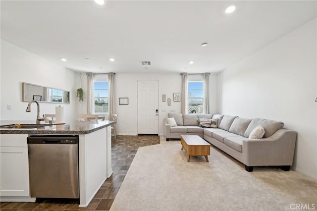 34495 Agave Dr Unit 1103, Winchester, CA 92596 - living room with a healthy amount of sunlight, baseboards, visible vents, and recessed lighting