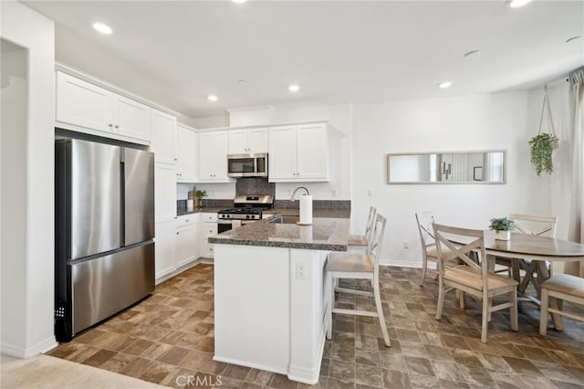 34495 Agave Dr Unit 1103, Winchester, CA 92596 - kitchen featuring stainless steel appliances, recessed lighting, and white cabinets