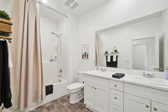 34495 Agave Dr Unit 1103, Winchester, CA 92596 - bathroom with visible vents, a sink, toilet, and double vanity