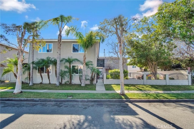 view of front of property with a front lawn