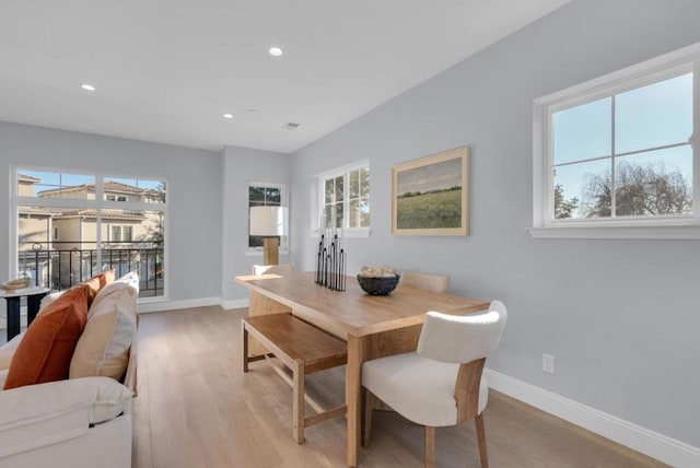 dining area with light wood-type flooring