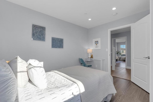 bedroom featuring wood-type flooring