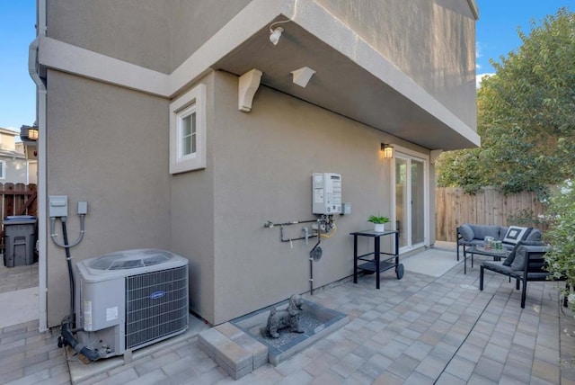 view of patio featuring outdoor lounge area and central AC unit