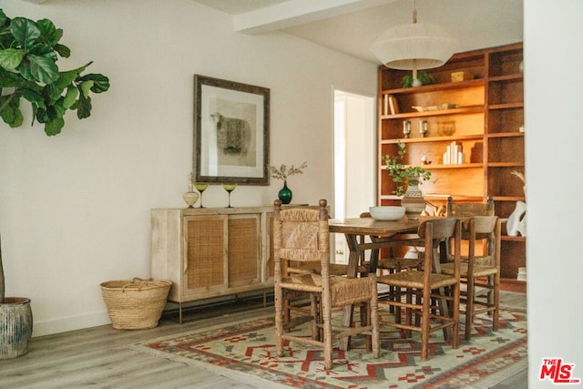 living area with hardwood / wood-style floors