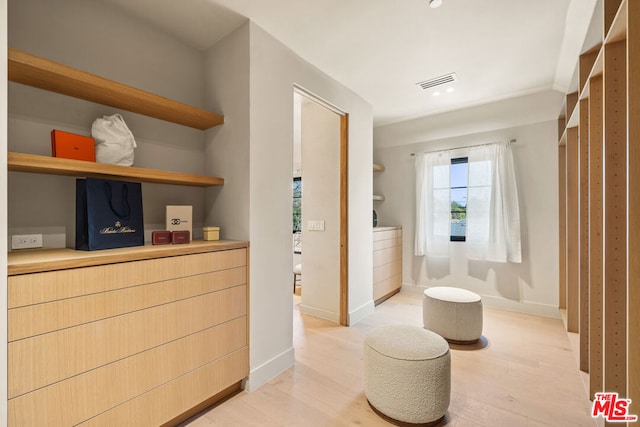 bathroom with wood-type flooring