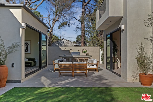 view of patio with an outdoor living space