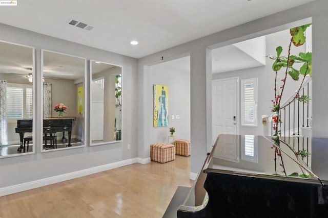 interior space featuring hardwood / wood-style flooring and a wealth of natural light