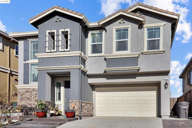 view of front of property featuring a garage