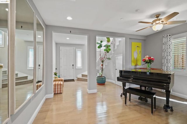 miscellaneous room featuring light hardwood / wood-style flooring and ceiling fan