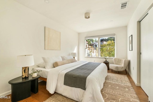 bedroom featuring hardwood / wood-style floors