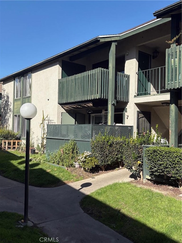 view of property exterior with stucco siding