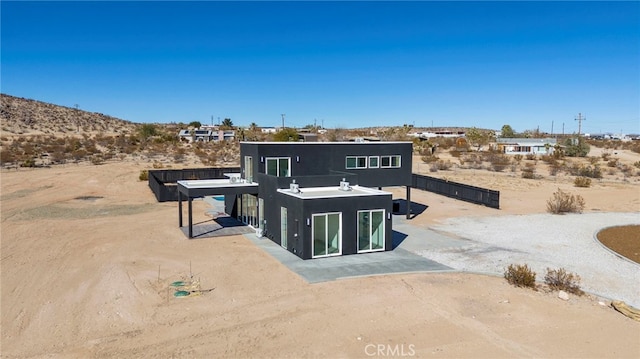 view of front of home featuring a patio