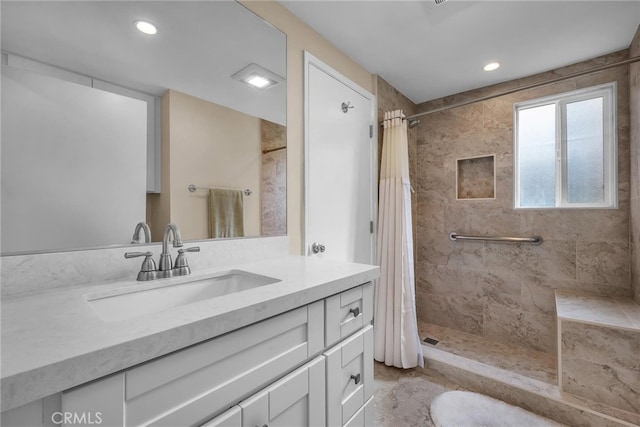 bathroom with vanity and a shower with curtain