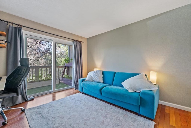 living room with wood-type flooring