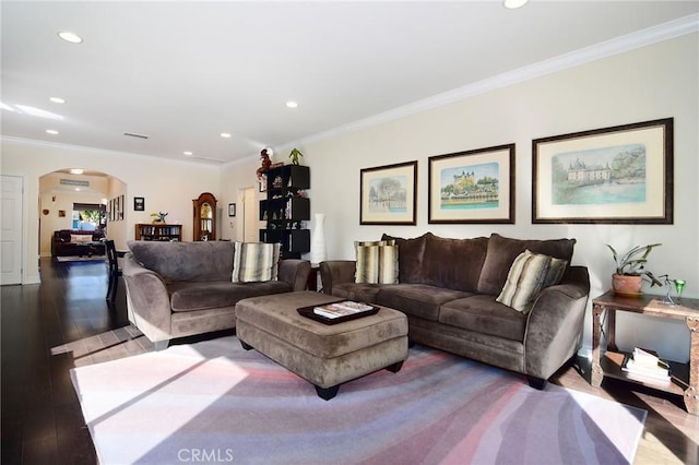 living room with ornamental molding and light wood-type flooring