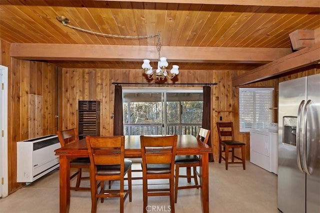 dining space featuring a chandelier, wood ceiling, beam ceiling, and wood walls