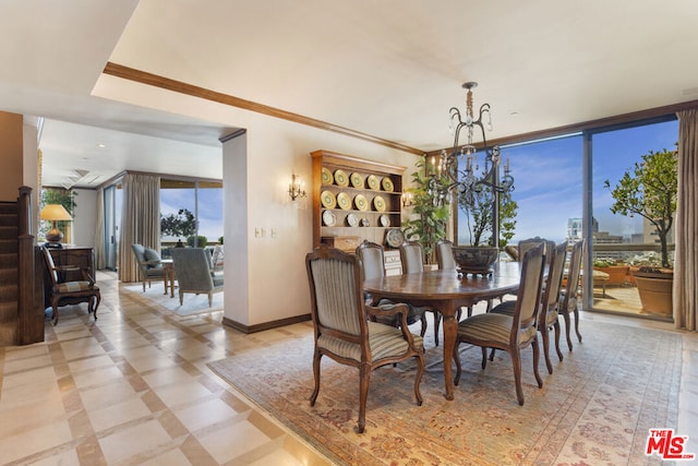 dining room with a wall of windows and crown molding