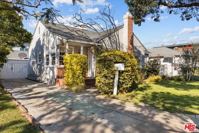 view of front of home with a front yard