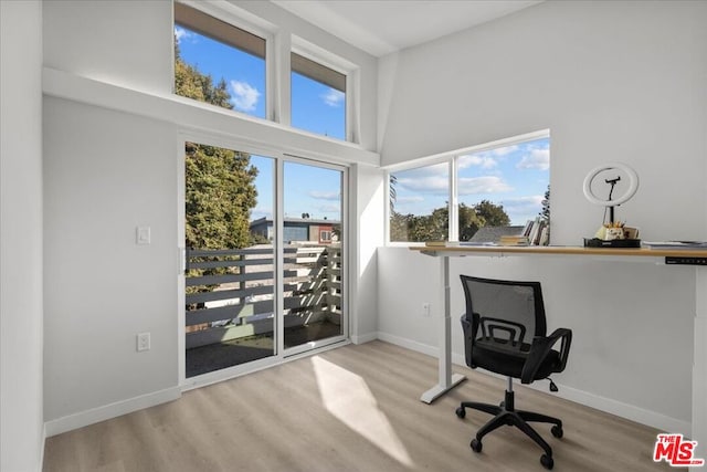 office area with light wood-type flooring