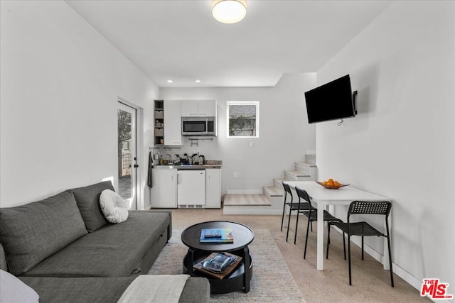 living room featuring a wealth of natural light