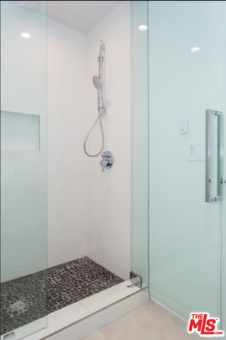 bathroom featuring walk in shower