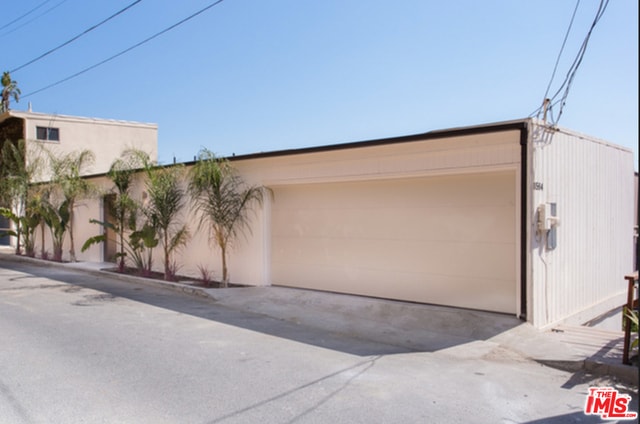 exterior space with a garage