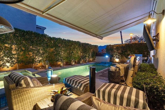 view of pool featuring a patio area and an outdoor living space