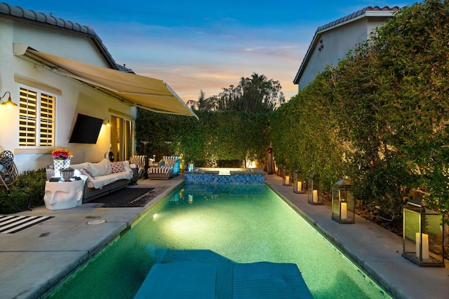 view of swimming pool featuring an in ground hot tub, a patio area, and outdoor lounge area