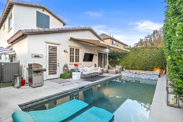 back of house with a fenced in pool, a patio area, central AC unit, and outdoor lounge area