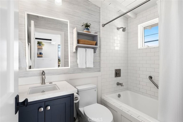 full bathroom featuring toilet, vanity, and shower / tub combo with curtain